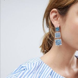 Metal drop earrings with recycled denim stones